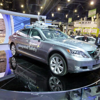 an image of toyota's self driving car at CES 2013